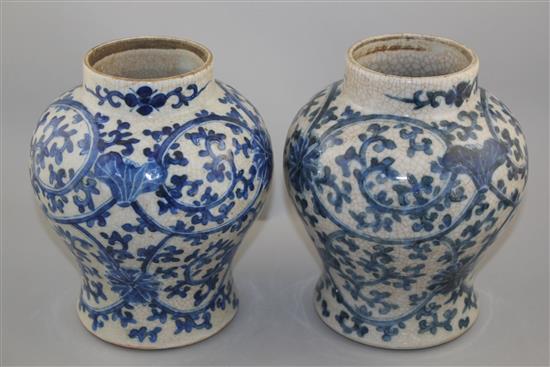 A pair of Chinese blue and white crackle glaze baluster vases, late 19th / early 20th century, 22cm